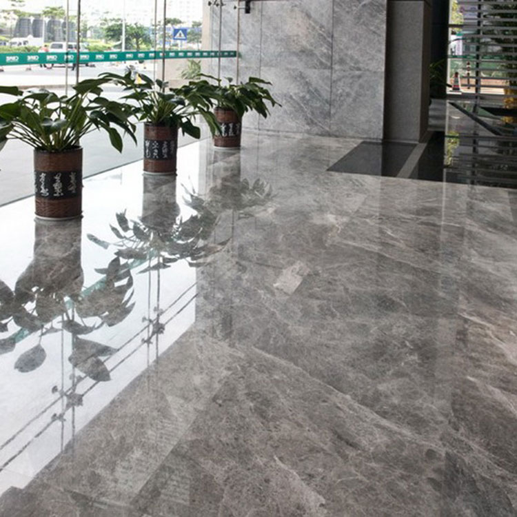 What are some common applications for marble tiles in interior design and architecture?